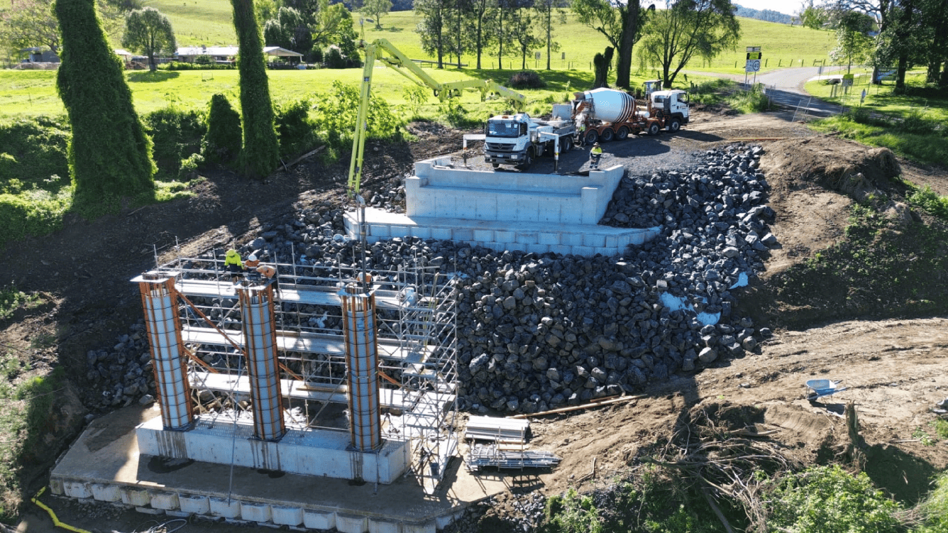 Adding concrete for the base of the bridge